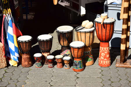 Drums for sale in the street market in Riga, Latviaの写真素材