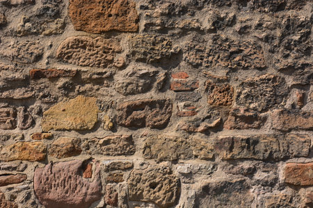 Old stone wall as a background. Texture. Close-up.の写真素材