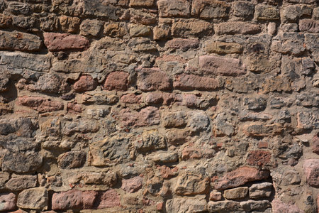 Background of old stone wall texture. Old brick wall background for design.の写真素材
