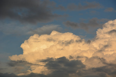 Cloudscape, Colored Clouds at Sunset near the Ocean on a Cloudy Day