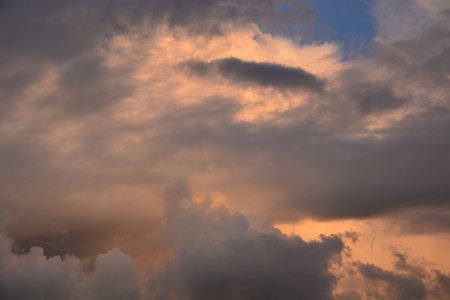 Cloudscape, Colored Clouds at Sunset near the Ocean in a Tropical Climateの写真素材