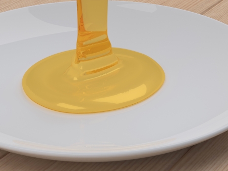 liquid caramel flow on white plateの写真素材