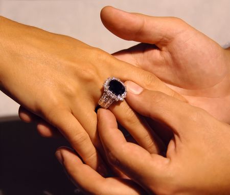 woman look jewelery at the goldsmith             