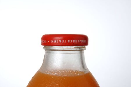 orange bottle lid at grey