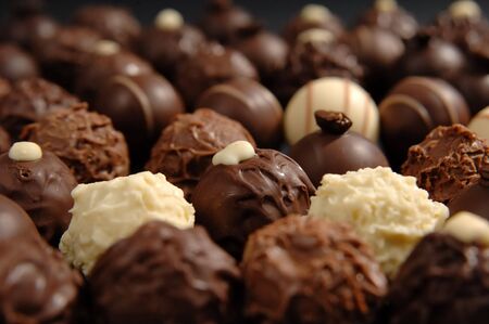 several chocolates group on the black background