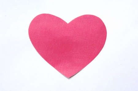 heart shape notepaper isolated at white               の写真素材