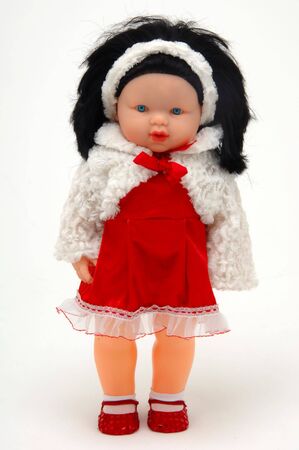 plastic doll isolated at white background            の写真素材