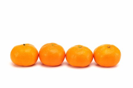 fresh tangerine group isolated at white backgroundの写真素材
