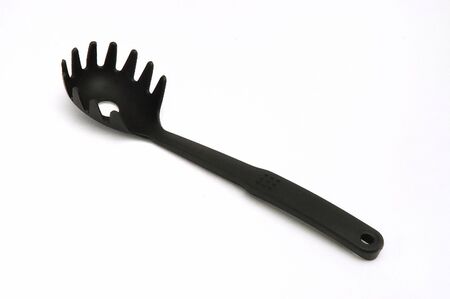 black pvc kitchen-ware isolated at white background                           の写真素材