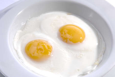 fried fresh egg serve with the dishの写真素材