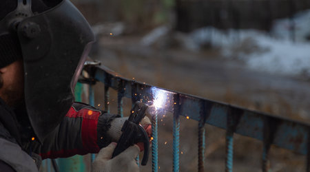 Metal welding, metal fence repair.