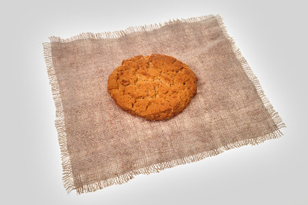 Oatmeal cookies on burlap. Oatmeal cookies on a gray background.の写真素材