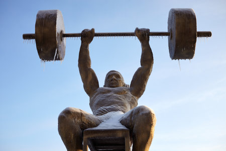 Sculpture of an athlete covered with ice.の写真素材