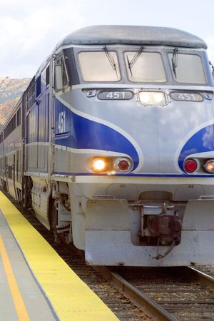 Train stopping at station.