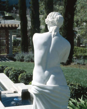 White female statue in garden.の写真素材