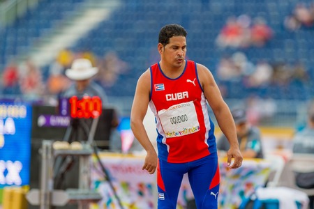 Franklin Oquendo, Cuban paralympic athlete partakes in the Discus throw. Athletics competition and medals ceremonies during the Toronto Parapan Am Games 2015のeditorial素材