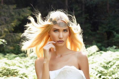fantasy girl in the woods.Beautiful Blond young Woman in Forest.Summer Beauty blondeの写真素材