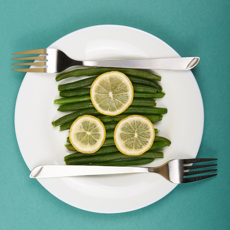 healthy food still life. vegetarian plate.siliculose haricotの写真素材
