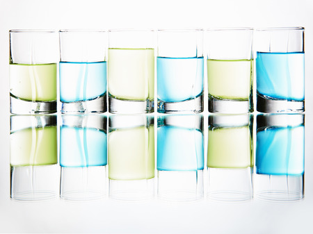 art Still life with glasses in bar.a lot of glasses with colorful cocktailsの写真素材