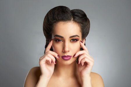 fashion portrait of beautiful young woman.beauty make up girl.colorful eye shadowの写真素材