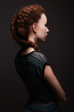 beauty girl with braids hairstyle. beautiful young womanの写真素材