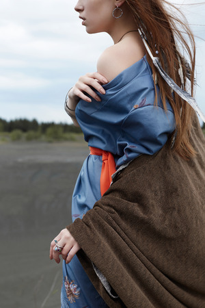 Young woman in the nature. Indian style wear. walking lifestyle ethnics girlの写真素材