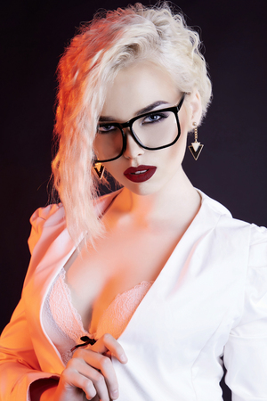 sexy beautiful blonde woman in glasses.passion sexy teacher womanの写真素材