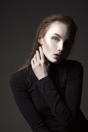 Beautiful girl with wet hair. beauty fashion woman portraitの写真素材