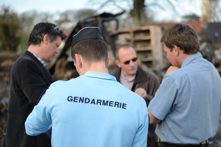 Normandy, France, April 2014.
Arson attack in a farm. Farm building and farm equipment calcined. Rubble. First observation of the police and the adjuster investigator with the farmerのeditorial素材