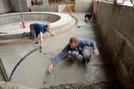 Normandy, France, may 2013.
Construction of an automatic milking rotary by three brothers farmers...