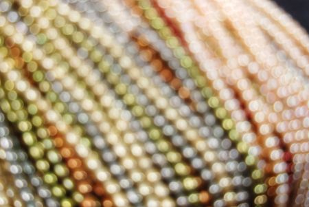 colorful pearl strands backgroundの写真素材