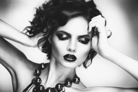 black and white dark short hair beauty woman portrait fashion model on white backgroundの写真素材