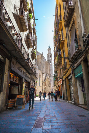 Barcelona, Spain - April 17, 2016: Medieval buildings in the Gothic and Born distric, narrow streetのeditorial素材