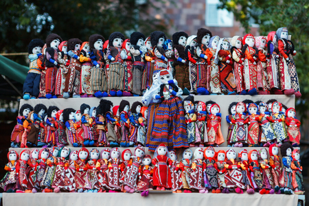 Armenian ancient traditional doll souvenir made from cloth fabric in national costumes sold in the market vernisazhの写真素材