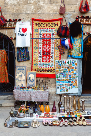 Tradional Azerbaijani souveniers in Baku old city, carpets, dishes, magnetsのeditorial素材