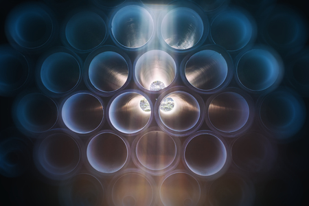 background of colorful big plastic pipes used at the building site close-up frontal viewの写真素材