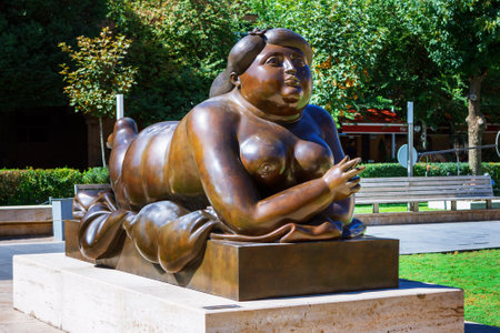 Yerevan, Armenia - 26 September 2016: Woman Smoking a Cigarette statue in Tamanian street near Yerevan Cascade Complex. Sculptor is Fernando Botero.のeditorial素材