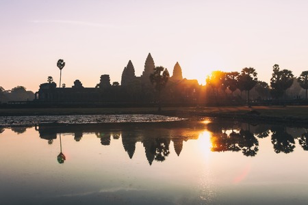 Silhouette of main temple Angkor Wat at sunrise and reflection, the best time in the morning at Siem Reap, Cambodia. Khmer architectureの写真素材