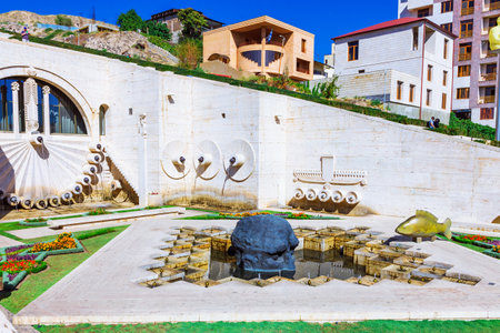 Yerevan, Armenia - 26 September, 2016: The second 2nd level of Cascade with skull, fish and eagle on the wall fountainのeditorial素材