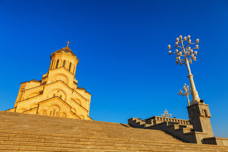 Tbilisi, Georgia - 8 October 2016: Main view with the stair case to Tbilisi Sameba Cathedral Tsminda (Holy Trinity) biggest curch Orthodox Cathedral in Caucasus region, Eurasia. Exterior. Front viewのeditorial素材
