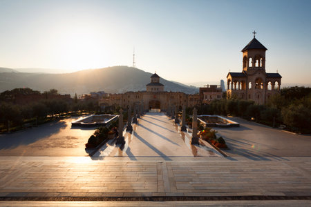 Tbilisi, Georgia - 8 October 2016: sunset view on Main gates entrance and cross to Tbilisi Sameba...