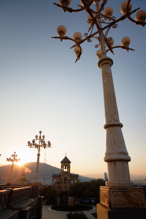 Tbilisi, Georgia - 8 October 2016: free-standing bell-tower and cross of Tbilisi Sameba Cathedral...