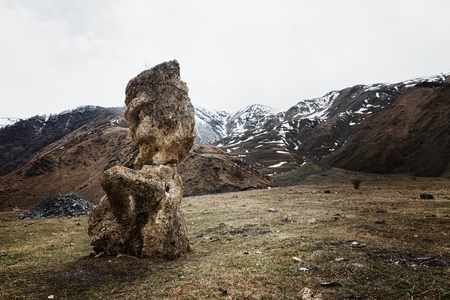 Stone face head of Rustaveli, Chavchavadze, Vazhapshavelo and Kazbegi in Sno valley in Georgia along...