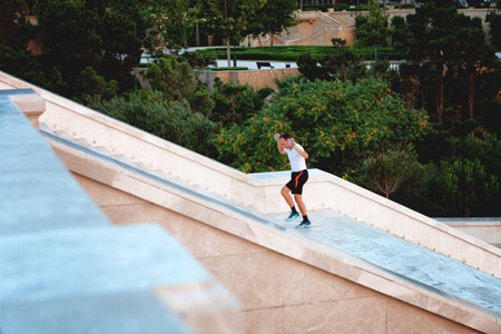 BAKU, AZERBAIJAN - July 16, 2015: man runs in the morning in Baku, sports trainingのeditorial素材