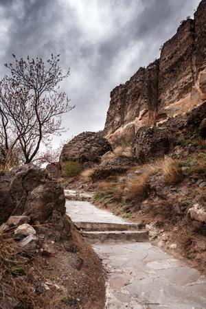 Walk path Vardzia cave city-monastery. Vardzia was excavated in the Erusheti Mountain on the left bank of the Kura River, thirty kilometres from Aspindza, one of the main attractions of Georgiaの写真素材