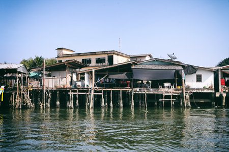 Chumphon, Thailand - 9 February 2014: Fishing boats at the coastal fishing villages. Preparation sea fishing. Sailing by Chumphon riverのeditorial素材