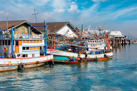 Chumphon, Thailand - 9 February 2014: Fishing boats at the coastal fishing villages. Preparation sea...