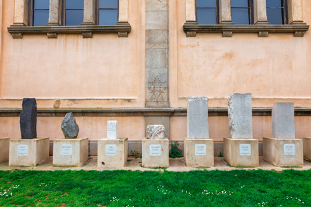 Grave stones in front of the botanic garden in Citadel park. The Parc de la Ciutadella is a park on the northeastern edge of Ciutat Vella, Barcelona, Catalonia, Spain.の写真素材