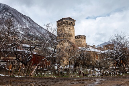Panoramic view on Medieval towers coverd with snow in winter in Mestia in the Caucasus Mountains, Upper Svaneti, Georgia. From the Museum of History and Ethnographyの写真素材