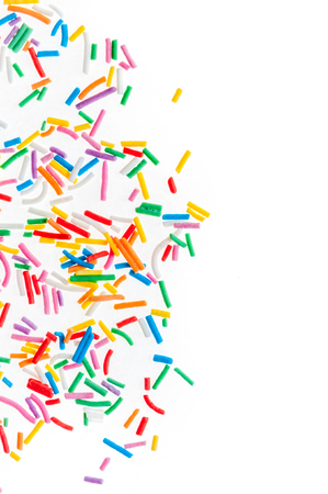 Colorful candy sprinkles isolated on white background cardの写真素材